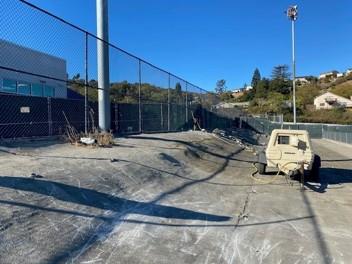 concrete area with a raised section on the left